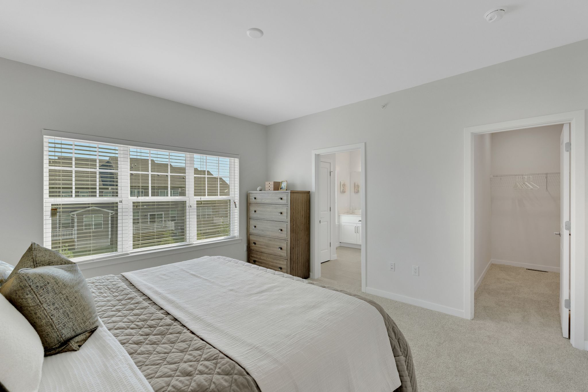 https://www.livesummerhill.com/wp-content/uploads/2024/08/Summerhill_Int_3BDMagnolia_Bedroom1-2_HomeJab_Aug2024.jpg